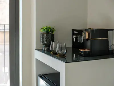 Cucina o angolo cottura di VICOLO SAN GAETANO -luxury rooms-
