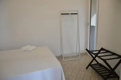 Letto o letti in una camera di Casa Dante