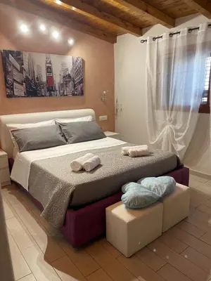 Letto o letti in una camera di OTTO SUITE