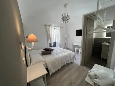 Letto o letti in una camera di B&B Doralice