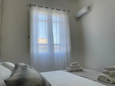 Letto o letti in una camera di Residenza del Borgo