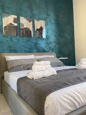 Letto o letti in una camera di Residenza del Borgo