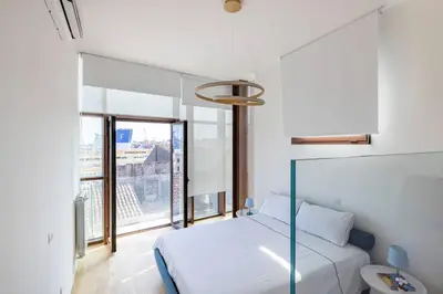 Letto o letti in una camera di Casa di Viola - SeaView in the Heart of Catania - Romantic Apt for 2 guests