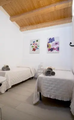Letto o letti in una camera di A Casa di Sonia
