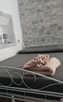 Letto o letti in una camera di Casa Lucia Ortigia