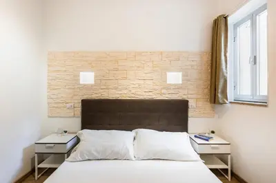 Letto o letti in una camera di Pantanello Rooms Avola