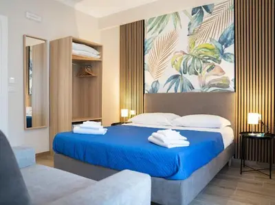 Letto o letti in una camera di My Home Catania Rooms