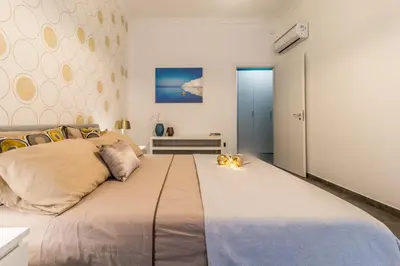 Letto o letti in una camera di Sirhouse - Boutique Apartment in Ortigia