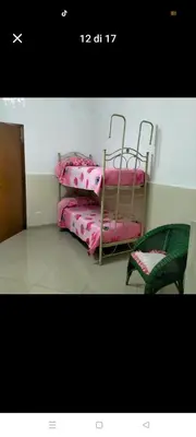 Letto o letti in una camera di Suit catania1946