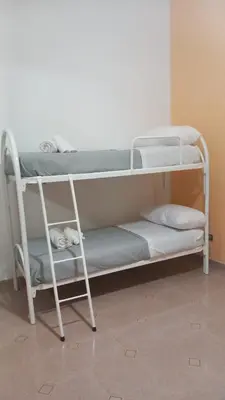Letto o letti in una camera di a casa della nonna