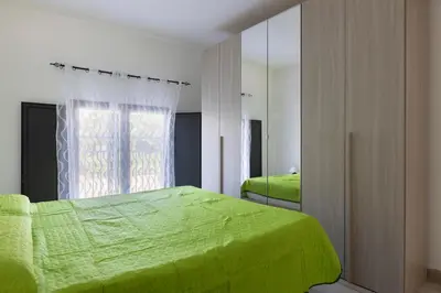 Letto o letti in una camera di LAURINI 21 APARTMENT