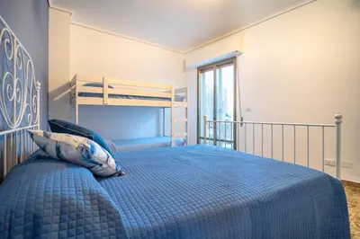 Letto o letti in una camera di Maiolica Rooms Appartamento Ragusa Ibla