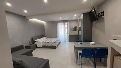 Letto o letti in una camera di I 3 Principi, Garibaldi Apartment