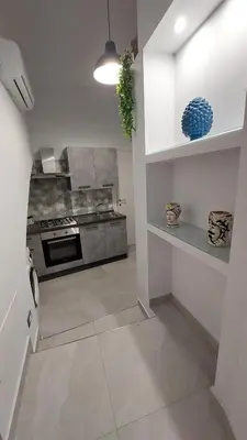 Cucina o angolo cottura di I 3 Principi, Garibaldi Apartment