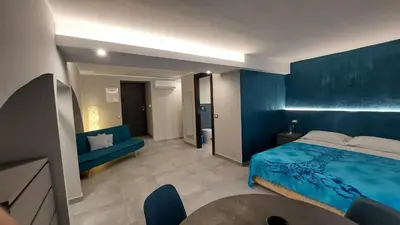 Letto o letti in una camera di I 3 Principi, Garibaldi Suites