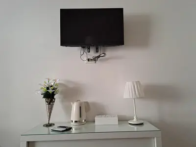 TV o dispositivi per l'intrattenimento presso Star suite ☆