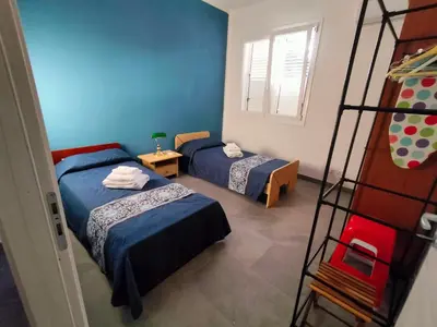 Letto o letti in una camera di Villa Isabella