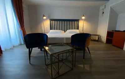 Letto o letti in una camera di Lanterne Magiche Ortigia Suites