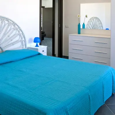 Letto o letti in una camera di Villa Amateia