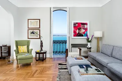 Area soggiorno di Duomo Sea View Suite by Ortigia Apartments