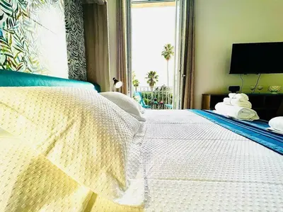 Letto o letti in una camera di Foro Siracusano 22, Luminoso e confortevole Loft