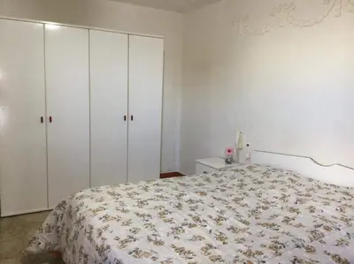 Letto o letti in una camera di Mansarda arredata