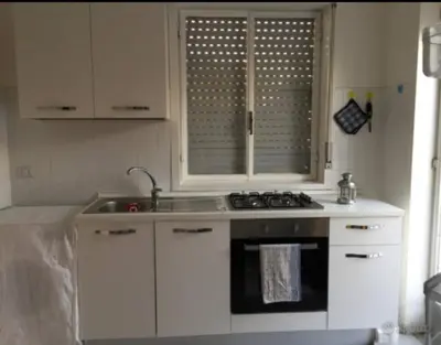 Cucina o angolo cottura di Villa Fiori giardino, 400 m. mare con parcheggio