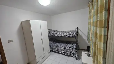 Letto o letti in una camera di La casa di Marta