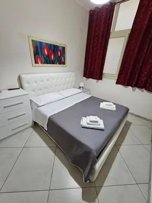 Letto o letti in una camera di LU&TO HOUSE CATANIA