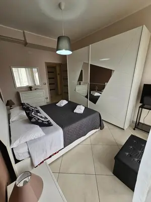 Letto o letti in una camera di LU&TO HOUSE CATANIA