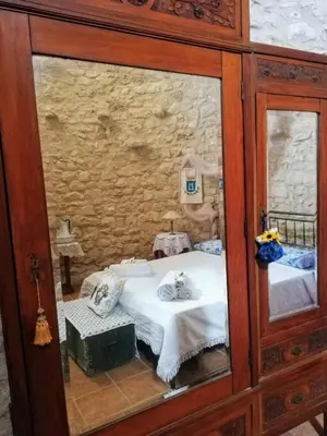 Letto o letti in una camera di Torre Rodosta