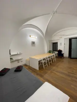 Area soggiorno di SAN MICHELE HOME - Appartamento in centro storico Catania