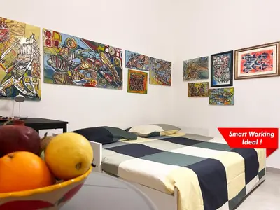 Letto o letti in una camera di Casa Mariolina, brand new refurbished 2 bed apartment in the historical center