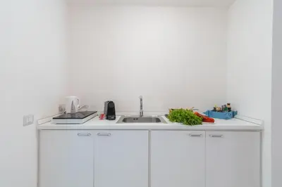Cucina o angolo cottura di Arco del Mercato Suite