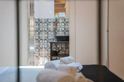 Letto o letti in una camera di Arco del Mercato Apartment
