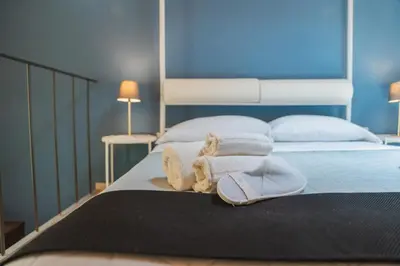 Letto o letti in una camera di Arco del Mercato Apartment