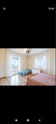 Letto o letti in una camera di Casa Melina e enzo