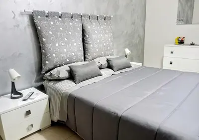 Letto o letti in una camera di sciuliddA Casa Vacanze
