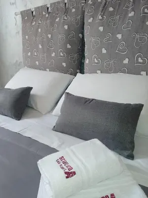 Letto o letti in una camera di sciuliddA Casa Vacanze
