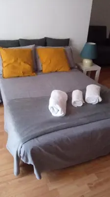 Letto o letti in una camera di Fikus APT relax Castello Ursino