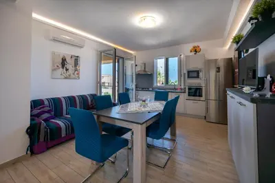 Cucina o angolo cottura di Hybla Sea Apartment - SiciliaVacanza