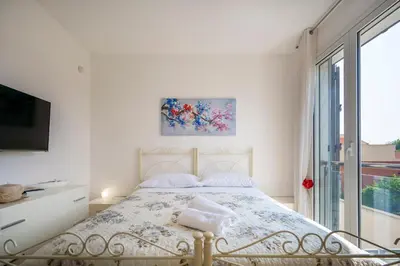 Letto o letti in una camera di Hybla Sea Apartment - SiciliaVacanza