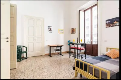 Letto o letti in una camera di Binario 8 Catania Stazione Centrale