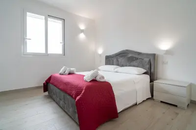 Letto o letti in una camera di The Onames Inn colors
