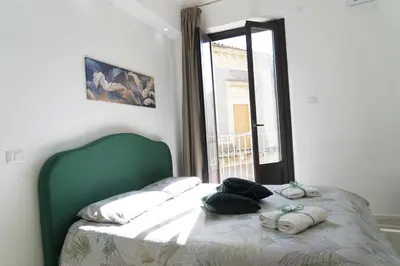 Letto o letti in una camera di Martiry Suite Apartment