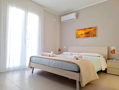 Letto o letti in una camera di Perla del golfo - Ortigia Holidays