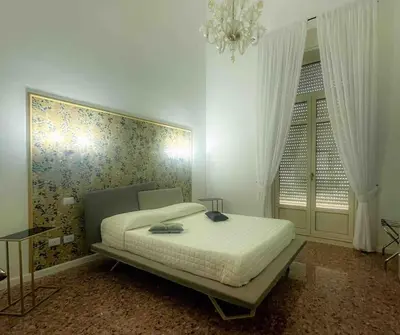 Letto o letti in una camera di VersOrtigia Home Beautiful Apartment