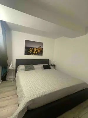 Letto o letti in una camera di VersOrtigia Home Beautiful Apartment