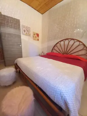 Letto o letti in una camera di L'isola del relax