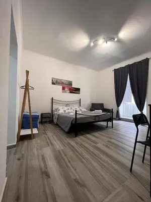 Letto o letti in una camera di L Ancora di Ortigia